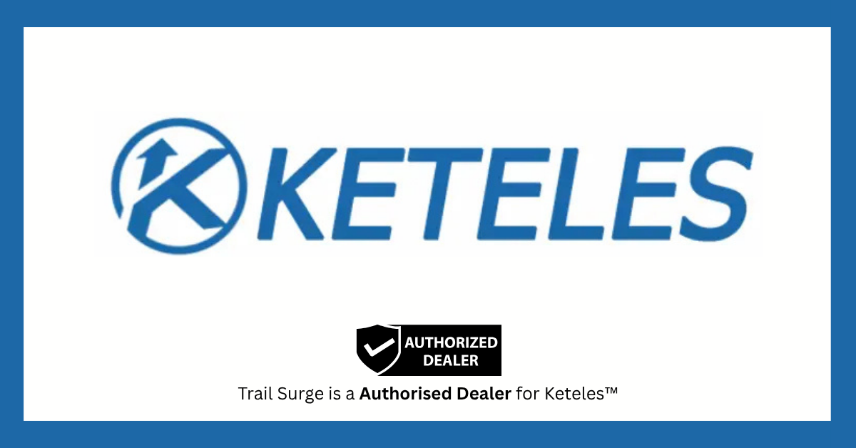 The image features the KETELES logo in blue with a circular icon. Below, a badge reads AUTHORIZED DEALER, and text states, Trail Surge is a Authorised Dealer for Keteles™. Blue borders frame the image.
