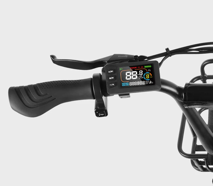 Close-up of an electric bicycle handlebar with a digital display showing speed, battery level, and various indicators. The handle grip and brake lever are also visible against a plain background.