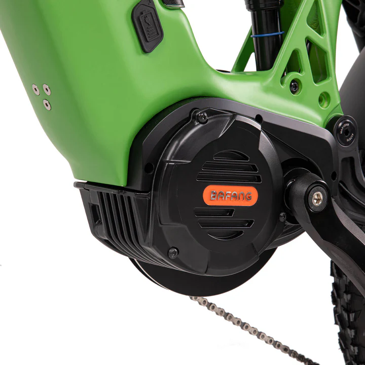 Close-up of a green electric bicycle frame highlighting a black BAFANG motor with visible bolts and chain.