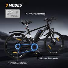 A black electric bicycle is shown with labels pointing to its three modes: Walk Assist Mode, Normal Bike Mode, and Pedal Assist Mode. An inset shows the bike’s digital display screen.
