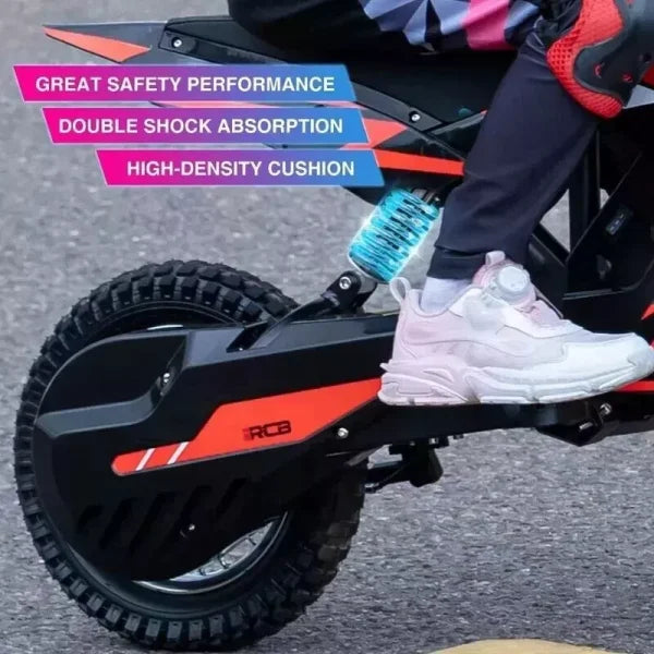 A close-up of a child riding a black and orange electric bike, showing the rear wheel and suspension. Text overlays highlight features: great safety performance, double shock absorption, and high-density cushion.